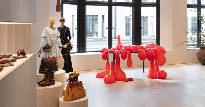 loewe flagship london store red sculpture blob shoes fashion design wooden floor window
