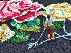 Cathy Scola cross stitching